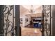 Grand entrance showcasing an open floor plan with a game room and a view of the backyard at 2330 N Channing --, Mesa, AZ 85207