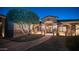 Charming home exterior featuring a walkway, iron gate, and a well maintained yard at 2330 N Channing --, Mesa, AZ 85207