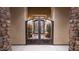 Wrought iron entry gate with an ornate design to the front door at 2330 N Channing --, Mesa, AZ 85207