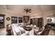 Inviting living room with stone fireplace, comfortable sectional sofa, and view to the outdoor area at 2330 N Channing --, Mesa, AZ 85207