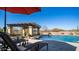 Resort-style pool with rock features and a pergola offers relaxation and recreation at 2330 N Channing --, Mesa, AZ 85207