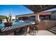 Luxurious pool and cascading water features, with built-in bar seating at 2330 N Channing --, Mesa, AZ 85207