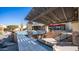 Resort-style pool and spa, complete with a pergola and outdoor kitchen at 2330 N Channing --, Mesa, AZ 85207