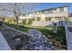 Modern townhome exterior with manicured lawn and rock landscaping, perfect for outdoor enjoyment at 3128 E Cheryl Dr, Phoenix, AZ 85028