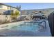 Community pool with lounge chairs, shaded seating and refreshing water features for residents at 3128 E Cheryl Dr, Phoenix, AZ 85028