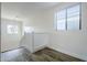 A staircase landing shows the white railing and trim, along with natural light and modern flooring at 3128 E Cheryl Dr, Phoenix, AZ 85028