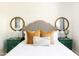 Tastefully decorated bedroom with stylish pillows, decorative mirrors and bright, natural light at 3726 S Juniper St, Tempe, AZ 85282