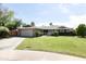 Charming single-story home with a well-manicured lawn and a two-car garage at 3726 S Juniper St, Tempe, AZ 85282