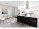 Spacious kitchen with a large island, granite countertops, and white cabinetry at 3726 S Juniper St, Tempe, AZ 85282