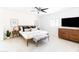 Comfortable bedroom featuring a large bed, nightstands with lamps, and a view of the closet at 3726 S Juniper St, Tempe, AZ 85282