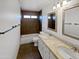 A modern bathroom featuring double sinks, and a shower-tub combo at 3732 E South Fork Dr, Phoenix, AZ 85044