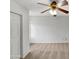 Cozy bedroom featuring neutral carpet and a ceiling fan with lighting at 3732 E South Fork Dr, Phoenix, AZ 85044