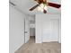 Spacious bedroom features neutral walls, carpet, closet, and ceiling fan at 3732 E South Fork Dr, Phoenix, AZ 85044