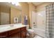 Bathroom featuring a single sink vanity, toilet, and shower-tub combination at 5110 W Sweet Iron Pass, Phoenix, AZ 85083