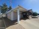 Spacious garage features covered patio and ample parking space, blending convenience with outdoor living at 650 N Hawes Rd # 4834, Mesa, AZ 85207