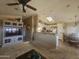 This open-concept living space includes a kitchen, dining area, and living room, great for modern living and entertaining at 650 N Hawes Rd # 4834, Mesa, AZ 85207