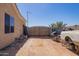 Wide gravel driveway leading to a gated property, showing the potential for customization and storage at 6935 N Valley Rd, Eloy, AZ 85131