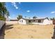 Picture of the backyard with a partial view of the home's exterior at 743 E Holmes Ave, Mesa, AZ 85204