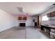 Spacious garage featuring cabinets and storage shelving at 743 E Holmes Ave, Mesa, AZ 85204
