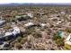 Aerial view of home featuring desert landscaping, a pool, and a red-tiled roof at 9370 E Calle De Las Brisas --, Scottsdale, AZ 85255