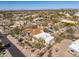 Aerial view of a beautiful home showcasing desert landscaping, pool and red tiled roof at 9370 E Calle De Las Brisas --, Scottsdale, AZ 85255