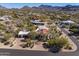 Aerial view of a desert-landscaped estate with a red tile roof and mountain views at 9370 E Calle De Las Brisas --, Scottsdale, AZ 85255