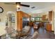 Spacious kitchen showcasing stainless appliances, an island, and a breakfast nook with stylish seating at 9370 E Calle De Las Brisas --, Scottsdale, AZ 85255