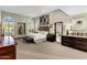 Large bedroom with windows, carpet flooring, a ceiling fan, and modern furnishings at 9370 E Calle De Las Brisas --, Scottsdale, AZ 85255