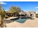 Outdoor pool surrounded by desert landscaping and a neutral tile patio at 9370 E Calle De Las Brisas --, Scottsdale, AZ 85255