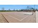 Outdoor basketball court ready for a pickup game, with well-maintained surface and hoops in a community setting at 9743 E Torino Ave, Mesa, AZ 85212