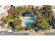 Aerial view of the community pool and surrounding landscape showcasing well-maintained grounds at 10757 N 74Th St # 1016, Scottsdale, AZ 85260