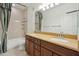 Bathroom with double vanity and tile surround at 10757 N 74Th St # 1016, Scottsdale, AZ 85260