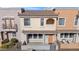 Charming townhome with a covered entryway, tidy desert landscaping, and warm color palette at 10757 N 74Th St # 1016, Scottsdale, AZ 85260