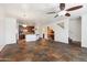 Spacious living area showcasing tiled flooring and a seamless connection to the kitchen at 10757 N 74Th St # 1016, Scottsdale, AZ 85260