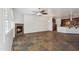 Inviting living space with a fireplace, tile floors and an open layout to the kitchen at 10757 N 74Th St # 1016, Scottsdale, AZ 85260
