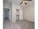 Bedroom featuring a closet, neutral paint, soft carpet, and a ceiling fan at 13223 W Indianola Ave, Litchfield Park, AZ 85340