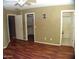 Large bedroom showcasing closet and bathroom access at 13819 W Berridge Ln, Litchfield Park, AZ 85340