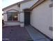 Inviting front entrance featuring a security door and a covered porch at 13819 W Berridge Ln, Litchfield Park, AZ 85340