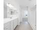 Contemporary bathroom with double sinks, walk-in shower, and stylish fixtures at 14634 W Sand Hills Rd, Surprise, AZ 85387