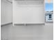 Spacious walk-in closet with ample shelving and natural light at 14634 W Sand Hills Rd, Surprise, AZ 85387