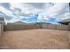 Unfinished backyard with block wall fencing at 18433 W Monte Lindo Ln, Surprise, AZ 85387