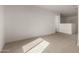 Upstairs bonus room area with plush carpet at 18433 W Monte Lindo Ln, Surprise, AZ 85387