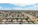 Overhead view capturing the expansive community, highlighting the tile roofs and varied architecture at 2032 E Sierra Madre Ave, Gilbert, AZ 85296