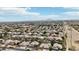 Expansive aerial view of a meticulously planned community with mountain views in the distance at 2032 E Sierra Madre Ave, Gilbert, AZ 85296