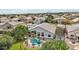 Aerial shot of a backyard with a pool, landscaping, and a view of the mountains at 2032 E Sierra Madre Ave, Gilbert, AZ 85296