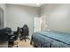 Bedroom featuring a ceiling fan, and desk and chair perfect for a teenager or office at 2032 E Sierra Madre Ave, Gilbert, AZ 85296