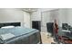 A bedroom with a closet, desk and chair perfect for a teenager or office at 2032 E Sierra Madre Ave, Gilbert, AZ 85296