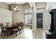 Dining room offers high ceilings, ample natural light, and entry view at 2032 E Sierra Madre Ave, Gilbert, AZ 85296