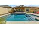 Beautiful backyard pool with a built-in step entry and a view of the covered patio at 2066 N Canelo Hls, Mesa, AZ 85207