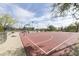 Outdoor basketball court with well-defined lines and lighting, ideal for sports and recreation at 2066 N Canelo Hls, Mesa, AZ 85207